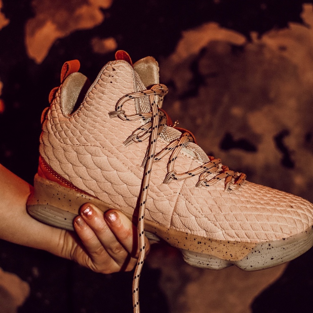 Pink and tan tennis shoes